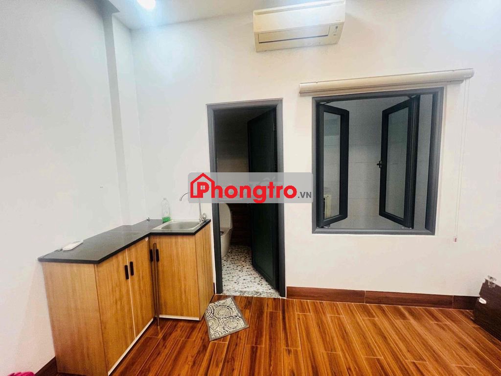 Phòng trọ ngay mặt tiền, có thang máy, nhà xây mới vào ở ngay