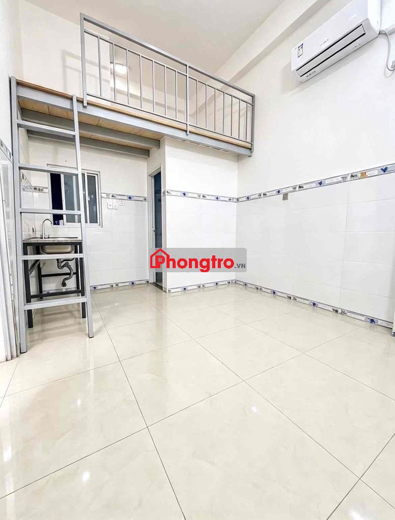 ngay cầu An lộc giáp Nguyễn Oanh có gác cao